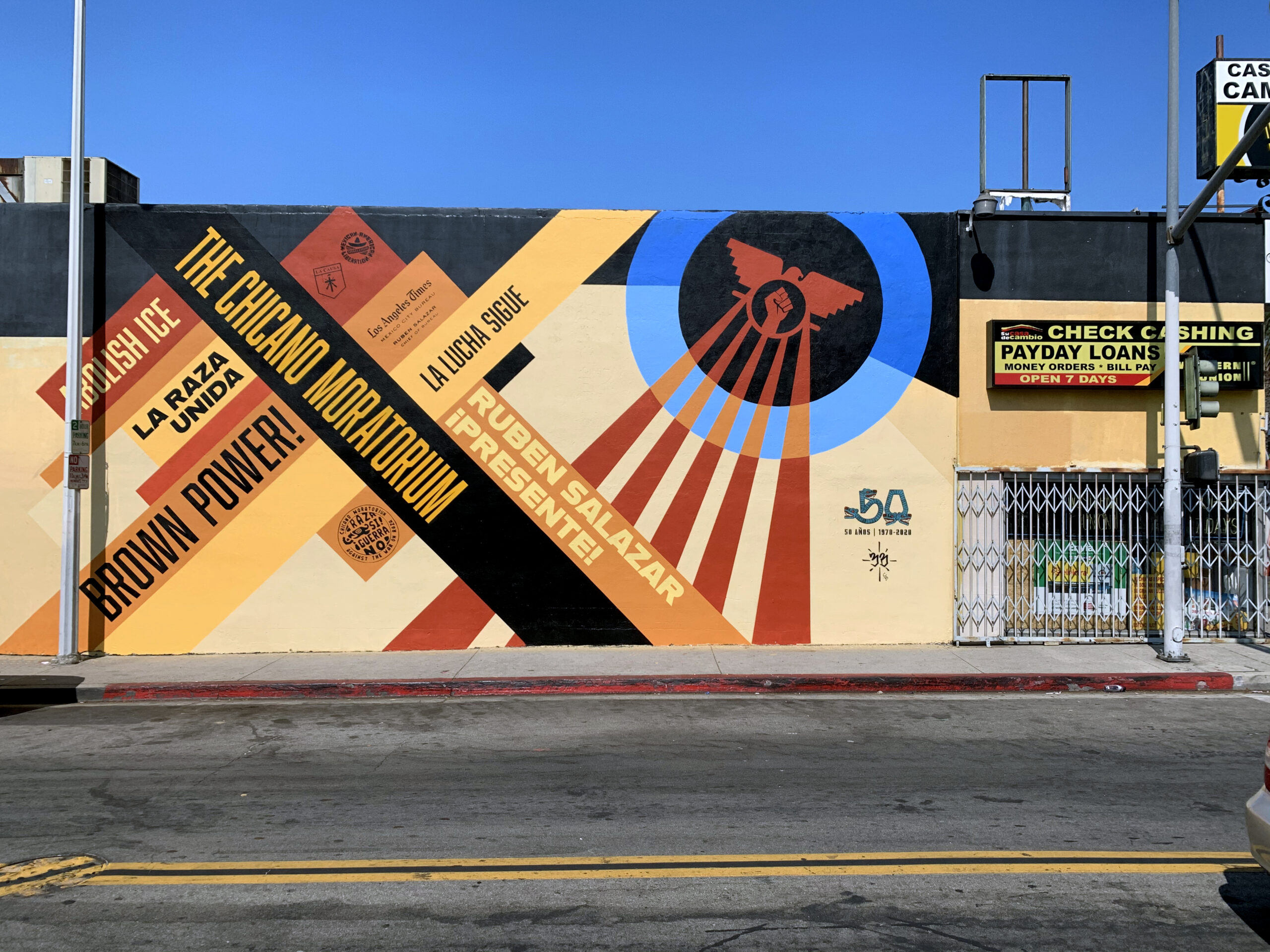 Large Geometric Mural with text and bright colors on Whittier Blvd